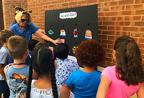 Children eating healthy lunches