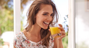 Woman drinking fruit juice