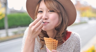 Woman eating ice cream cone